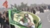 Shi'ite pilgrims walk from Baghdad Karbala