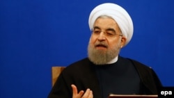 "They have forgotten that the Berlin Wall collapsed many years ago," Iranian President Hassan Rohani said.