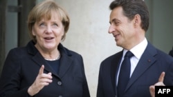 Канцлер ФРГ Ангела Меркель и президент Франции Николя Саркози в Елисейском дворце в Париже