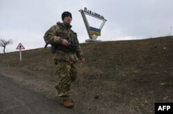 A Ukrainian serviceman on patrol in the Donetsk region (file photo)
