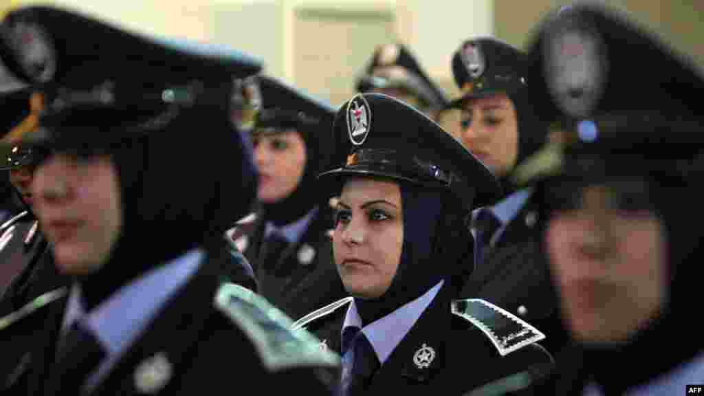 Women police officers in Baghdad attend celebrations marking the 91st anniversary of the founding of the country's police. (AFP/Ahmad Al-Rubaye)