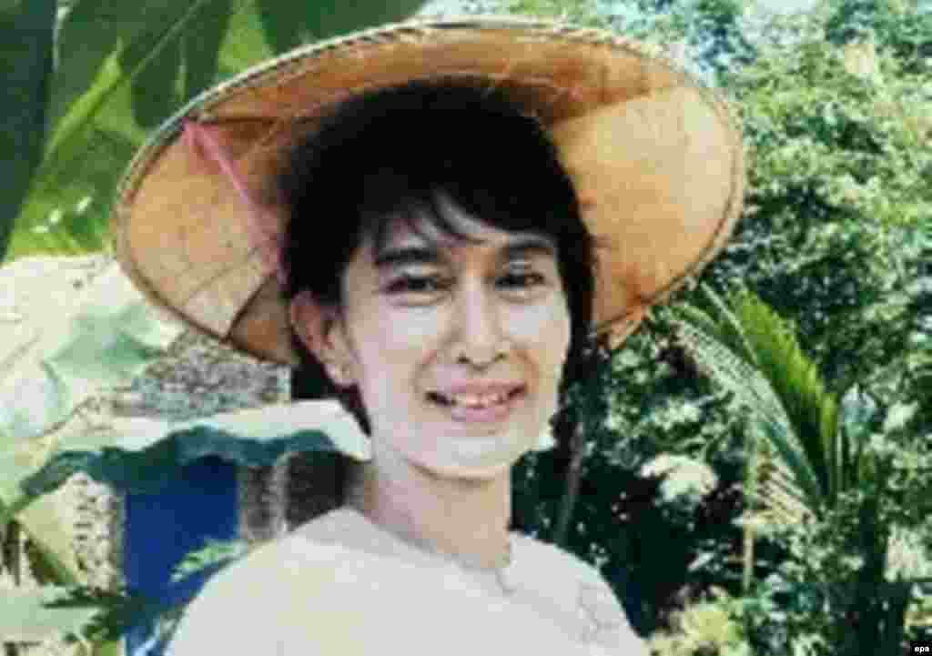 Burma -- Aung San Suu Kyi, Prime Minister-Elect, 2002 - A file photograph dated 2002 showing Nobel laureate and Myanmar Opposition party National League for Democracy (NLD) leader Aung San Suu Kyi pictured in her garden in the northern Burmese city of Mandalay, Myanmar, (Burma), On Sunday 19 June 2005, Aung San Suu Kyi will celebrate her 60th birthday, which in a Buddhist culture marks an important milestone in one's life. Aung San Suu Kyi is still kept under strict house arrest, and the Burmese generals have fortified themselves even more against any attempts at a dialogue 