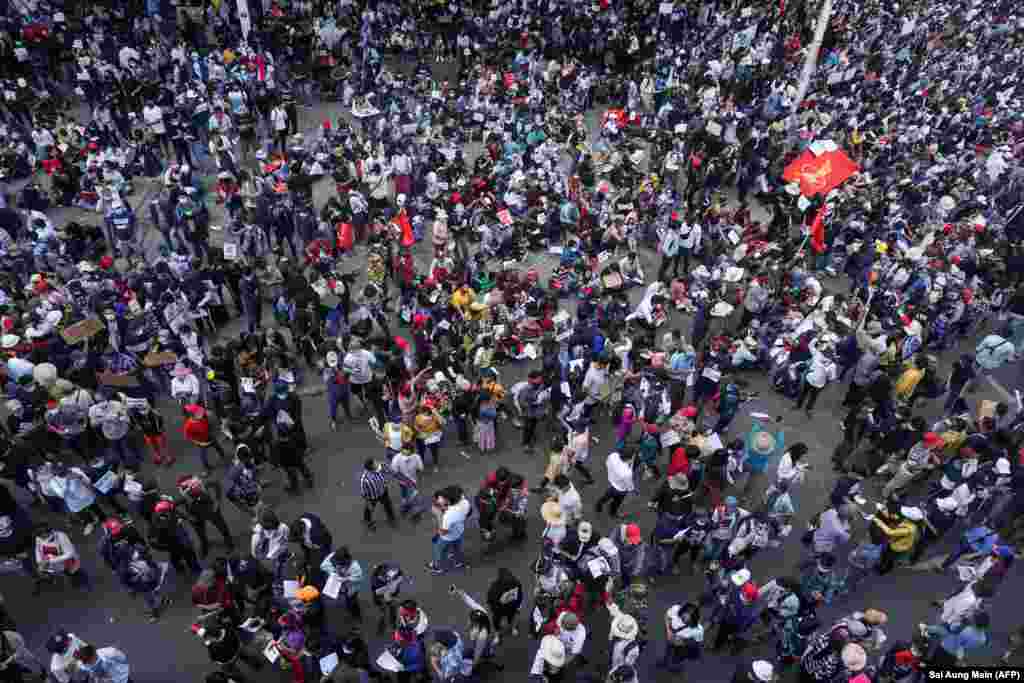 Protesters take part in a demonstration against the February 1 military coup in Yangon on February 9, 2021. (Photo by Sai Aung Main / AFP)