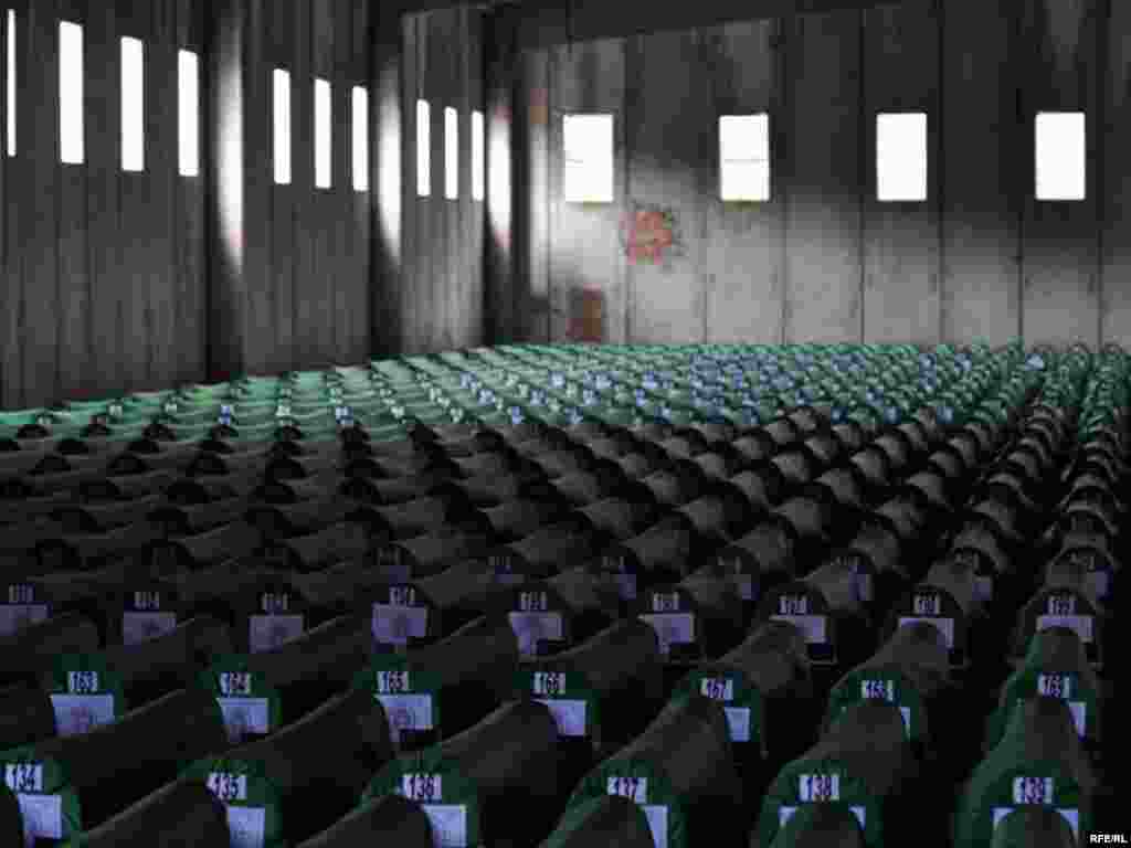 Coffins of newly identified victims of the 1995 Srebrenica massacre await burial at the Potocari memorial cemetery near Srebrenica on July 10, 2010.