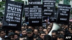Під час акції протесту біля посольства Росії в Малайзії після знищення над Донбасом малайзійського пасажирського літака рейсу MH17. Куала-Лумпур, 22 липня 2014 року