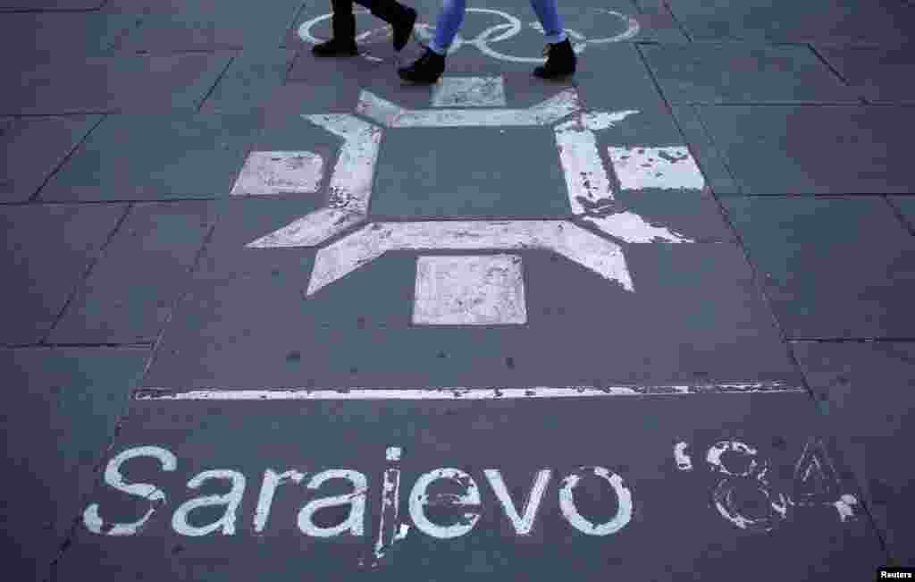 Another timeworn Olympic logo on a street in central Sarajevo