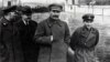 Soviet dictator Josef Stalin (center) and Soviet secret police head Nikolai Yezhov (right) walk near Moscow in 1937, the same year Yezhov signed Order No. 00447, which began the Great Terror.