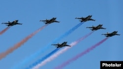 Armenia - Armenian Su-25 combat aircraft fly during a military parade in Yerevan, 21 September 2016.