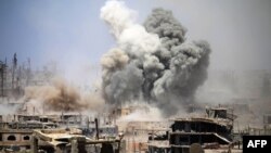 Місто Дараа на півдні Сирії, контрольоване повстанцями, зазнає ударів урядових військ, фото 22 травня 2017 року