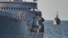 Разведывательный корабль «Приазовье» проекта «864» ЧФ России (на заднем плане)
