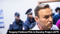 Russian opposition leader Aleksei Navalny attends a hearing in a Moscow court after being detained ahead of a rally in Nizhny Novgorod on September 29.