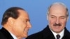 Belarusian President Alyaksandr Lukashenka (right) welcomes Italian Prime Minister Silvio Berlusconi to Minsk.