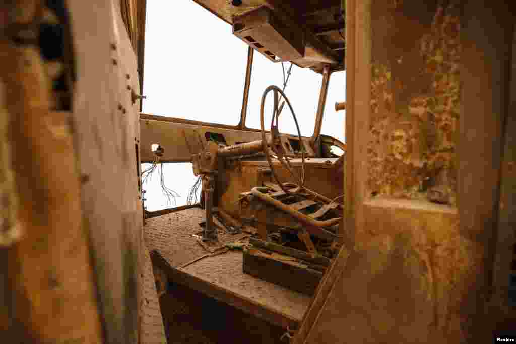 The burnt-out cab of a New York City Fire Department (FDNY) fire truck is seen inside the Memorial Museum.