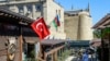 A restaurant displays Azerbaijani and Turkish flags in Baku&#39;s old town on October 14.&nbsp;