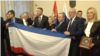 Serbia -- Belgrade -- Natalia Poklonskaya Deputy of the State Duma of Russian Federation with Bosko Obradovic founder and leader of the right-wing political party Dveri showing flag of Crimea in National Assembly of Republic of Serbia 