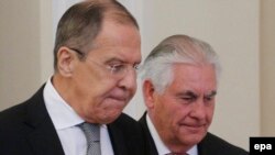 Russian Foreign Minister Sergei Lavrov, left, and U.S. Secretary of State Rex Tillerson arrive for bilateral talks at the Russian Foreign Ministry in Moscow on April 12.