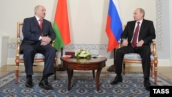 Russian President Vladimir Putin (right) meets with his Belarusian counterpart Alyaksandr Lukashenka in St. Petersburg on March 15. 