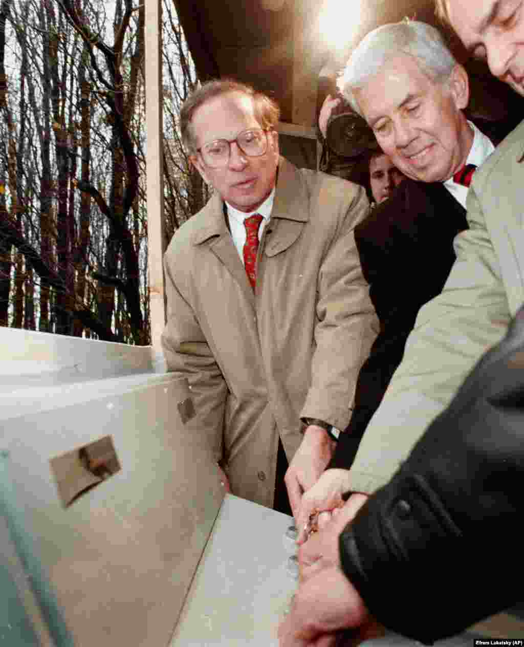 U.S. Senators Sam Nunn and Richard Lugar turn two tiny keys to initiate the destruction of a former Soviet nuclear missile silo in the formerly top-secret Khmelnitsky military base in central Ukraine on October 23, 1996. The keys once held the power to launch SS-19 missiles at the United States.