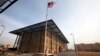 A U.S. flag flies in front of the Annex I building inside the compound of the U.S. Embassy in Baghdad. (file photo)