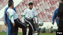 President Mahmud Ahmadinejad joins the national team in training in 2006.