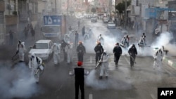 Iranian Firefighters disinfect streets in a bid to halt the spread of coronavirus, in Tehran, March 13 2020