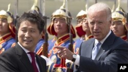 Mongolian Prime Minister Batbold Sukhbaatar (left) and U.S. Vice President Joe Biden