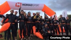 Участники акции «Issyk-Kul Swim Challenge 2019».