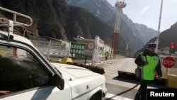 A Russian border guard patrols at the Verkhny Lars checkpoint on the border between Georgia and Russia in 2010.