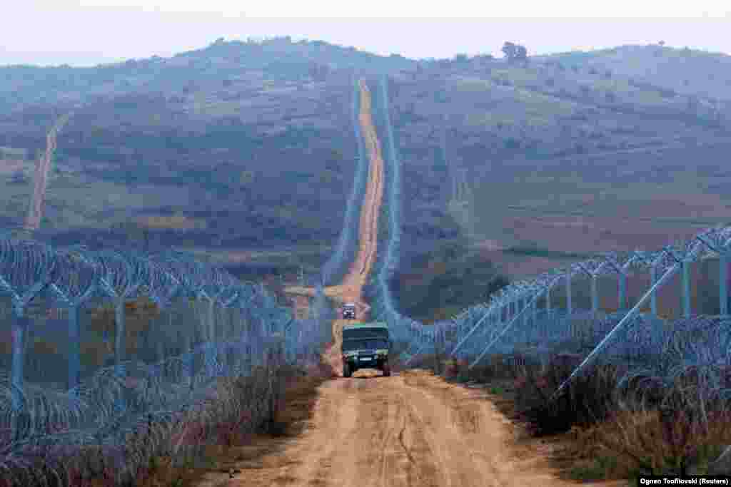 A military vehicle patrols the Greece-Macedonia border in 2016. Athens says Skopje&#39;s use of the name &quot;Macedonia&quot; suggests irredentist and territorial claims over Greece&#39;s northern region of the same name.