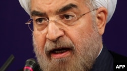 Иран президенті Хассан Роухани баспасөз жиынында сөйлеп тұр. Тегеран, 6 тамыз 2013 жыл