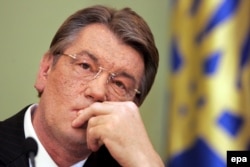 Former President Viktor Yushchenko, his face disfigured by dioxin poisoning, in 2006