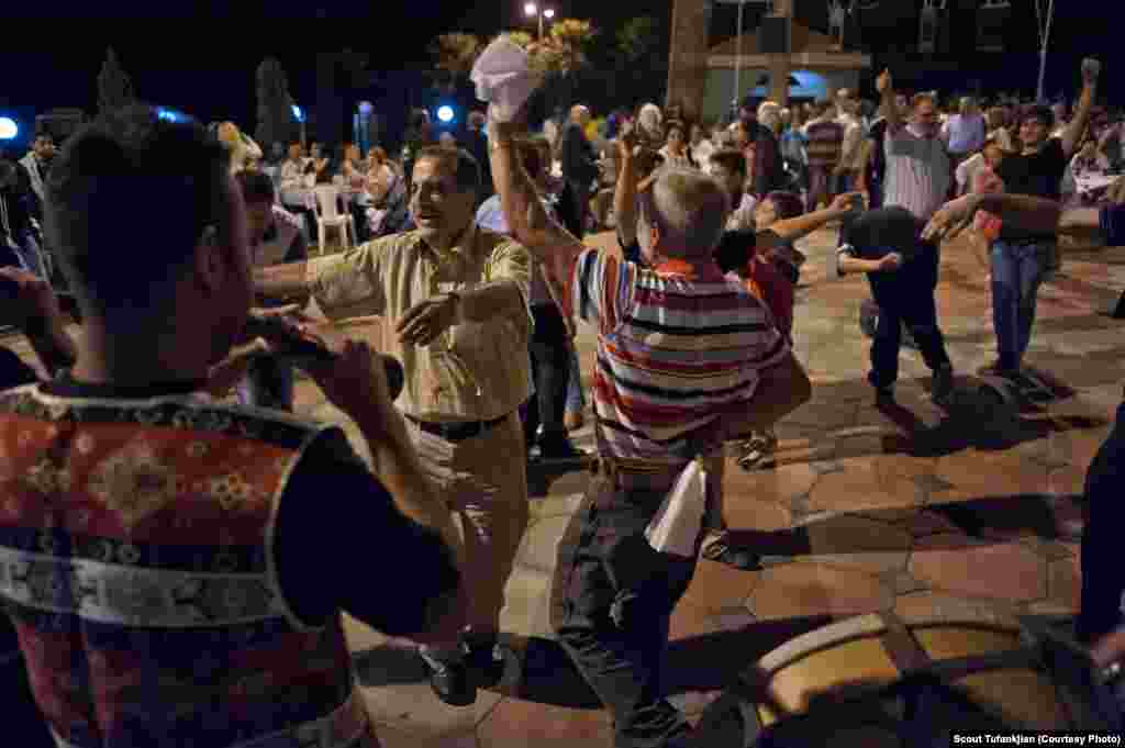 The last place Tufankjian visited for her project was Anjar, a village in Lebanon, the ancestral home of her great-grandparents and an area where Armenian cultural traditions are almost perfectly preserved. Here, local residents celebrate Surp Khach, or Holy Cross Day, with late-night dancing and eating.&nbsp;