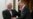 Russian Foreign Minister Sergei Lavrov (right) and Iranian Foreign Minister Mohammad Javad Zarif smile as they enter a hall for talks in Moscow on December 30.
