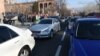 Armenia - Right-hand drive cars block a street in Yerevan during a protest held by their owners, 7Jan2018.