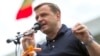 Andrei Nastase delivers a speech during a protest in front of the government building after his victory in the Chisinau mayoral runoff was invalidated, in Chisinau on July 1.