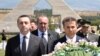 Some analysts fear that billionaire Bidzina Ivanishvili (right) may have something to do with tensions between Georgian Prime Minister Irakli Garibashvili (left) and the country's President Giorgi Margvelashvili (center -- file photo)