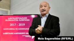 Vasil Maghlaperidze cited low audience figures and said that the suspension of programming was necessary in order "to create the financial and elementary technical-material base" that the broadcaster, unlike other TV stations, does not have and without which, he argued, it will prove unable to fulfill its purpose. 