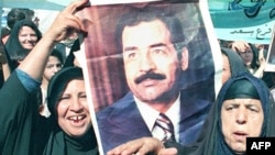 Портрет Саддама Хусейна