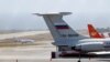 An airplane with the Russian flag is seen at Simon Bolivar International Airport in Caracas on March 24.