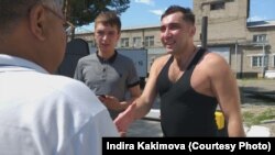 Civil activist Vadim Kuramshin (right) after his release from prison near Ust-Kamenogorsk on August 17.
