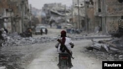 The Syrian town of al-Bab shows the damage from recent fighting.