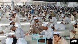 Many thousands of Tajiks study at religious schools abroad, including at least 4,000 in madrasahs such as this one in Pakistan.