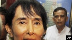 Myanmar -- Aung San Suu Kyi speaks to reporters at her National League for Democracy Party headquarters, 29Jun2011