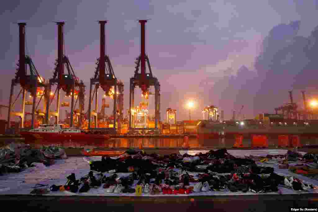 Recovered belongings believed to be from Lion Air Flight JT610, which crashed into the Java Sea shortly after takeoff on October 29, are laid out at Tanjung Priok port in Jakarta, Indonesia. All 189 people on board died in the crash. (Reuters/Edgar Su)