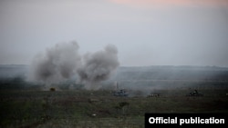 Nagorno-Karabakh - Tanks fire live rounds during a military exercise, 12Nov2013.