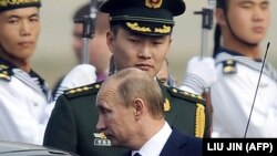 Владимир Путин во время визита в Китай. Пекин, 2011 год