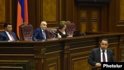 Armenia - Deputy Defense Minister Ara Nazarian (R) addresses the Armenian parliament, Yerevan, 2Jul2015.