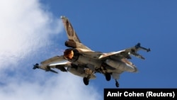 An Israeli F16 fighter jet takes off during a joint international aerial training exercise. FILE PHOTO