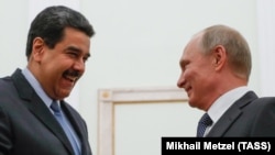 Russian Preident Vladimir Putin (right) Venezuelan President Nicolas Maduro (file photo)