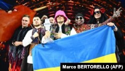 Kalush Orchestra, which represented Ukraine, poses after winning the 2022 Eurovision Song Contest in Turin, Italy, on May 15.